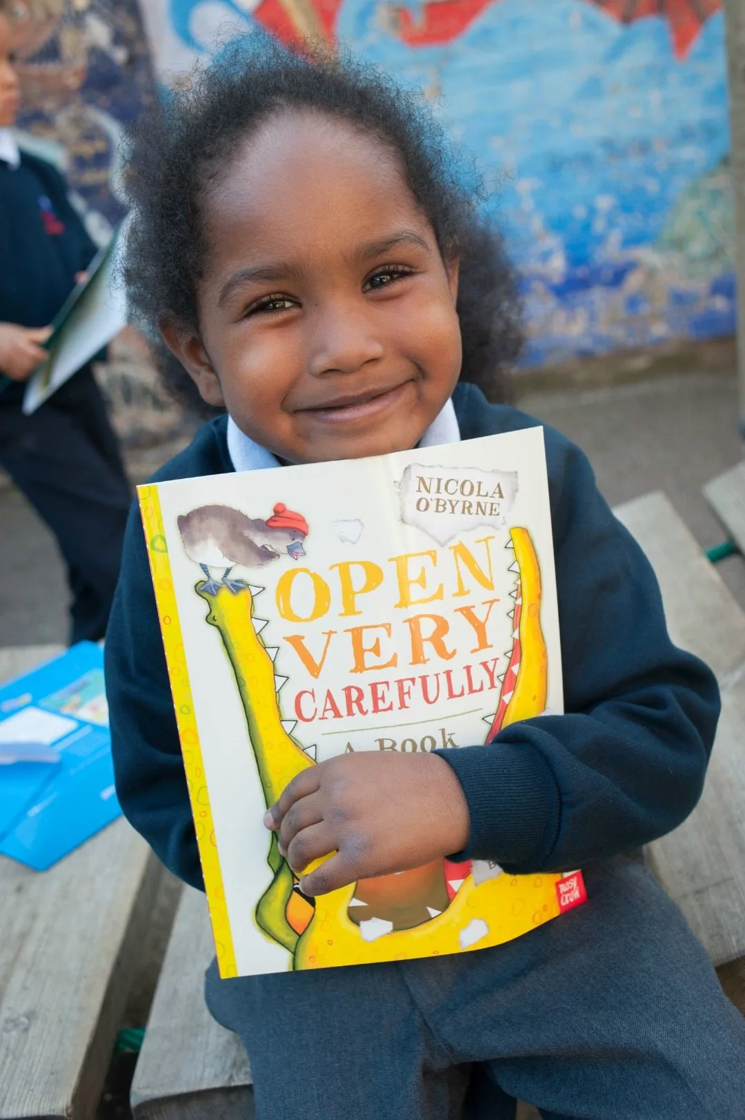 Reading is one of life's amazing pleasures. We've got 15+ back to school books for your kids to explore to make them smile as much as this gorgeous lady!