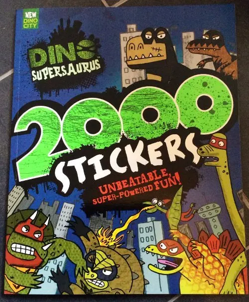 A child is excitedly purchasing stickers featuring a SuperSaurus character, which promises to bring unbeatable fun.