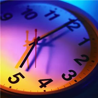 A quartz wall clock displays the time accurately.
