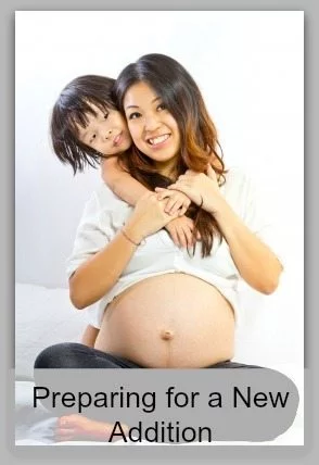 A person holds a child.