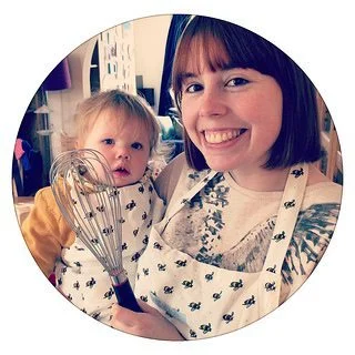 A person holds a baby.