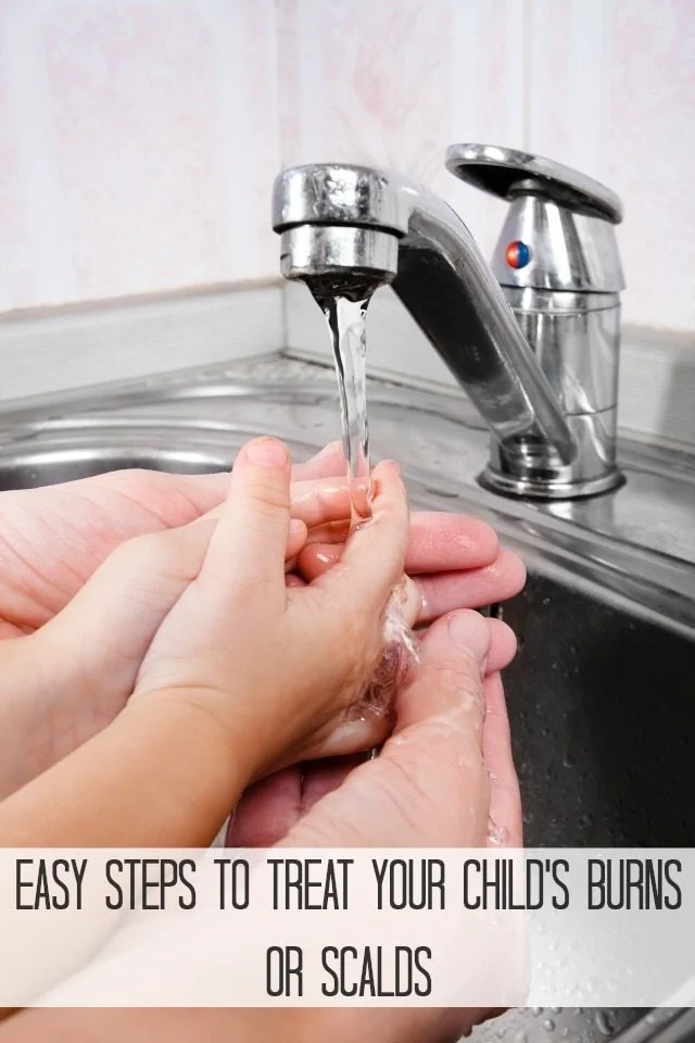 hands of women helps child to washes his hands