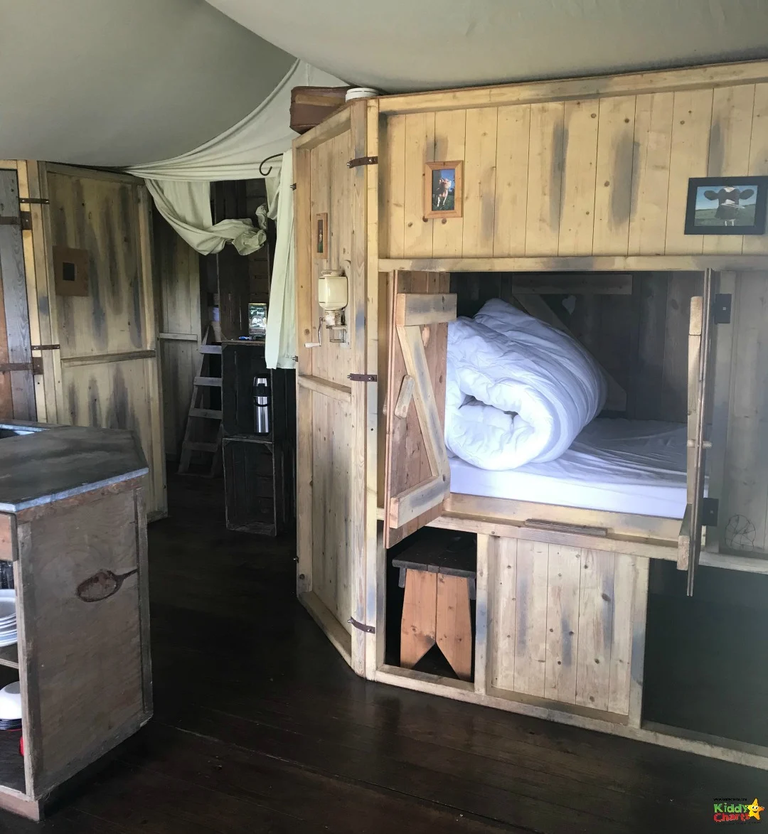 The kids just LOVED to be able to sleep inside the cupboard in the glamping location we reviewed: Featherdown. Go check it out! #travel #glamping #uktravel #kids