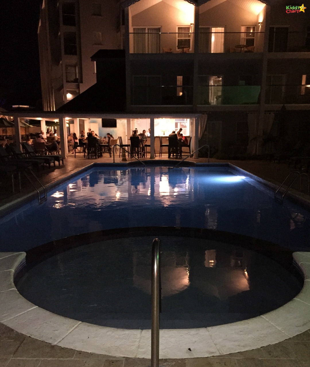 Sea Breeze Beach House Review - the Flying Fish at night - so relaxing, and look at that pool!