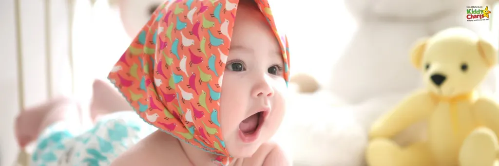 Baby wearing a headscarf.
