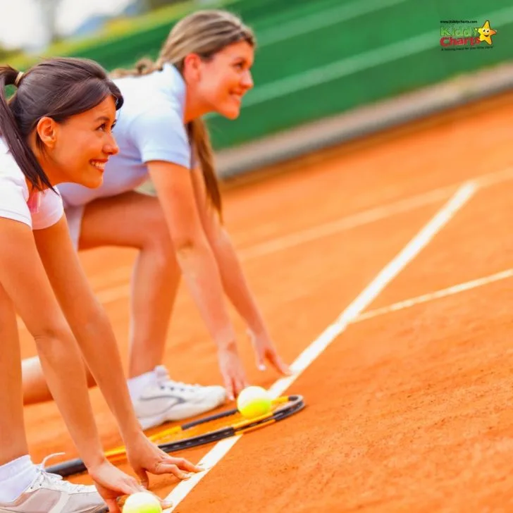 Two people play tennis.