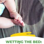 A parent is helping their child to learn how to stop wetting the bed.