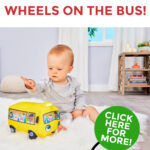 In this image, people are encouraged to click a link to enter a competition to win a Little Baby Bum Wiggling Wheels on the Bus toy.