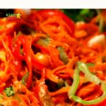 A family is preparing a Sweet Potato Chicken Stir Fry recipe from the Kiddy Charts website.