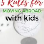 In this image, Kiddy Charts is providing five rules for parents who are considering moving abroad with their children.