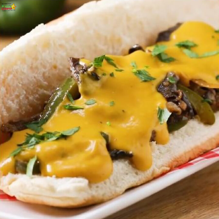 A hot dog bun is filled with a variety of ingredients to create a delicious American-style sandwich, making it a perfect snack food for any indoor meal.
