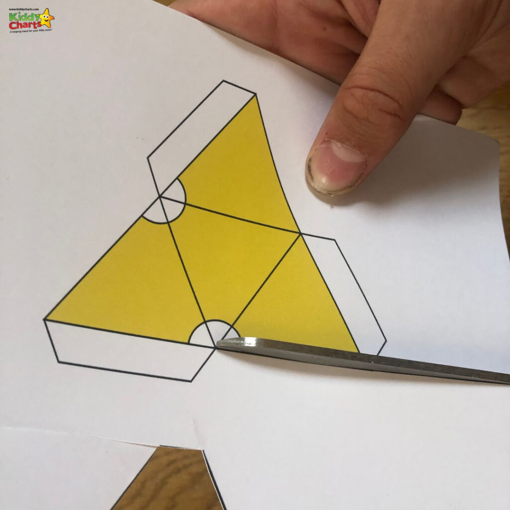A colorful origami design made from construction paper and art paper products on Kiddy Charts.