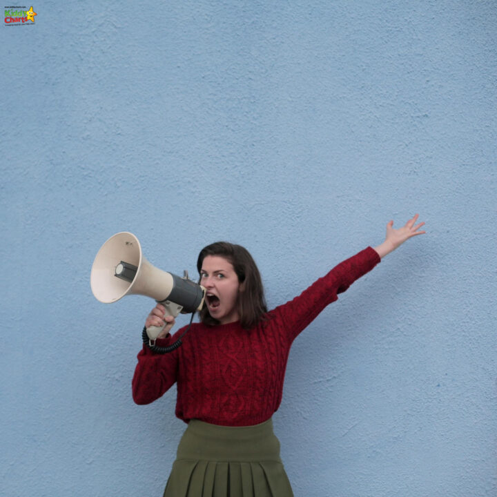 A person holds a megaphone.