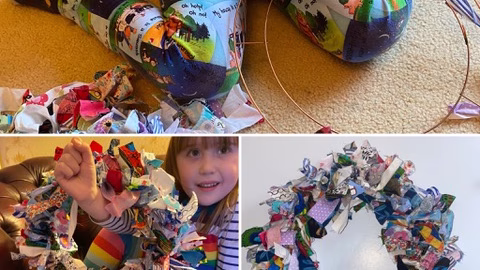 A person is crafting a handmade art toy indoors.