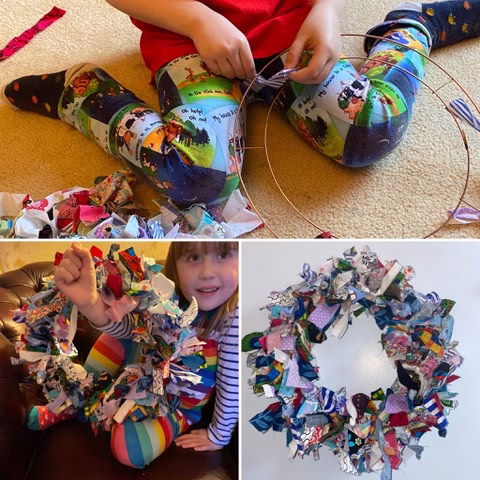 A person is crafting a handmade art toy indoors.