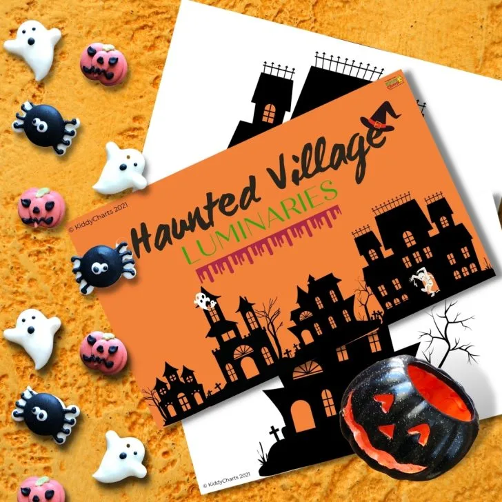 This image is depicting the KiddyCharts 2021 Haunted Village with four illuminated figures.