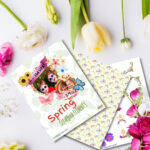 A handmade greeting card with a floral design featuring a flower and cheerful words of encouragement indoors.