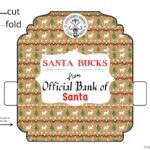 The image shows a printable Santa Bucks banknote that can be cut, folded, and glued to create a realistic-looking banknote.