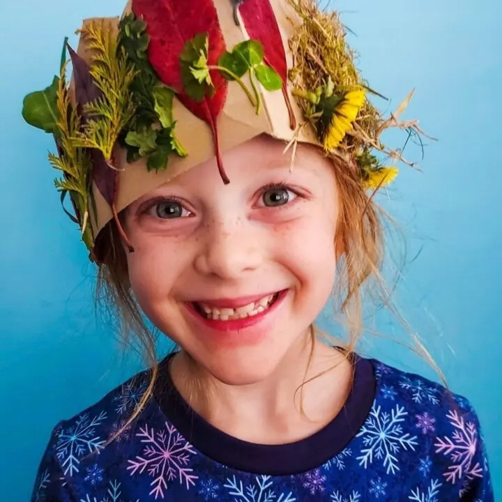 A person wears a flower crown.