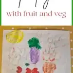 This image depicts a family painting with fruit and vegetables to create a picture for KiddyCharts.com.