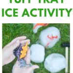 The child in the image is helping to promote a TUFF TRAY ICE ACTIVITY from the website KiddyCharts.com, as suggested by What Katy Said.