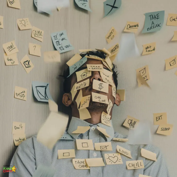A post-it note with handwritten text, a letter, and symbols is encouraging the reader to take a break, work out, breathe, wait, eat, sleep, and take care.