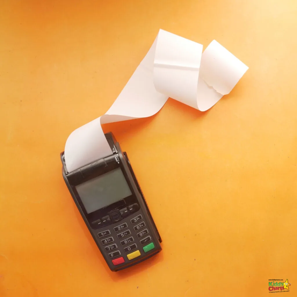 A cell phone sits on the table.