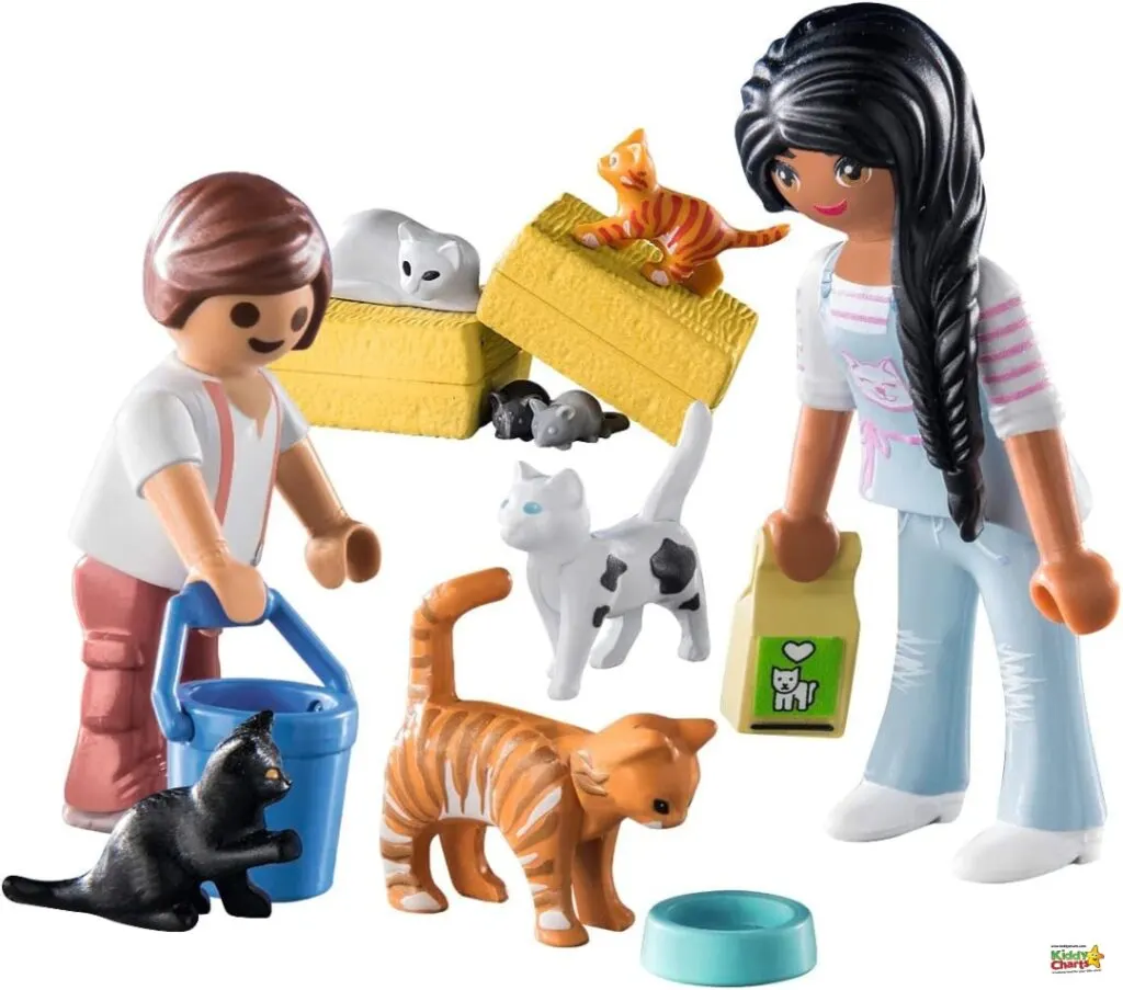 A cartoon person is playing with a toy cat and animal charts.