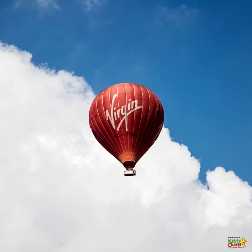 The hot air balloon floats in the sky.
