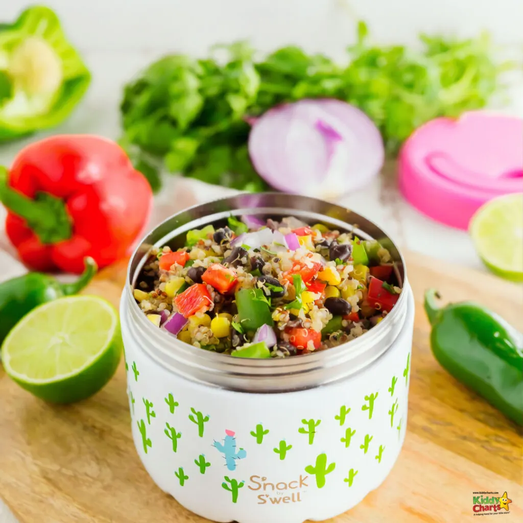 A bowl of vegetarian salad with cucumber, lemon, and other natural produce on a food storage container with a lid, providing a nutritious and delicious snack for a healthy diet.