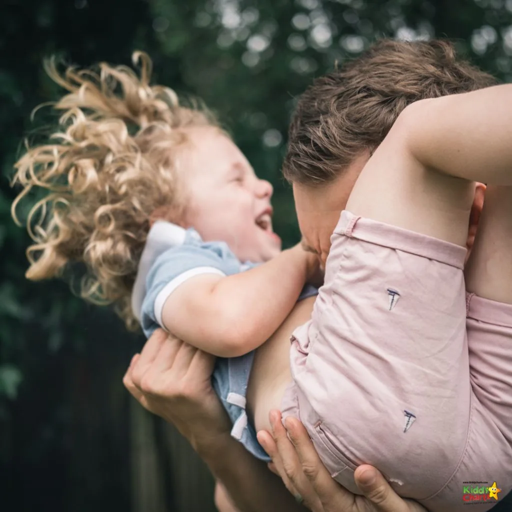 A person holds a baby.