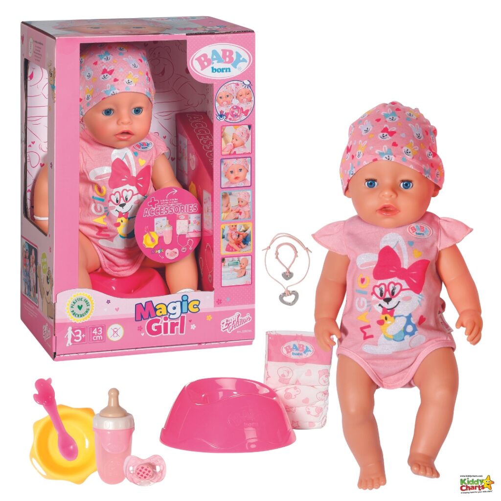 A person wearing a pink hat is playing with a Baby Born doll and other baby toys indoors.