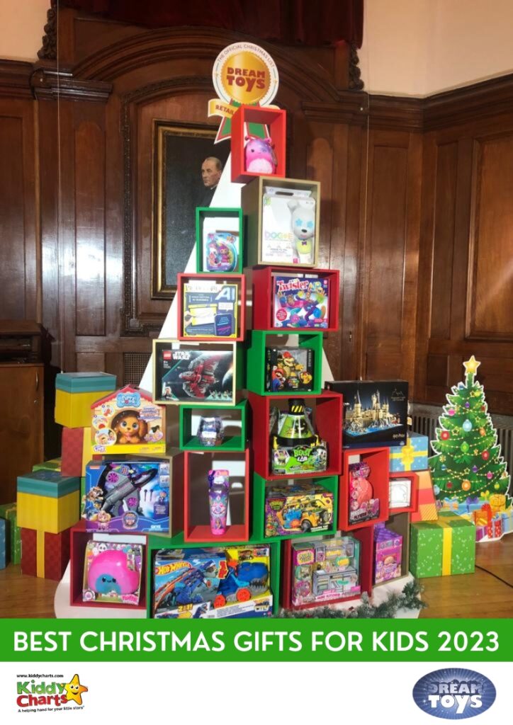 A decorated Christmas tree stands in the middle of an indoor room, filled with the best Christmas gifts for kids in 2023.