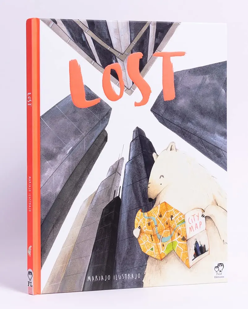 A person is searching for a lost city map of Mariajo Ilustrajo in the FIESt Editions.