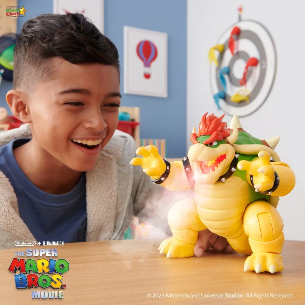 A joyful child interacts with a toy figure of Bowser, a character from the "Super Mario Bros." franchise, in a colorful room with playful decor.