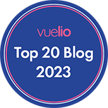 The image contains a circular badge with text stating "Top 20 Blog 2023" surrounded by a design that looks like an electronic circuit on a blue background.
