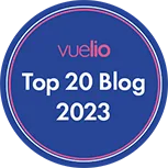 The image contains a circular badge with text stating "Top 20 Blog 2023" surrounded by a design that looks like an electronic circuit on a blue background.