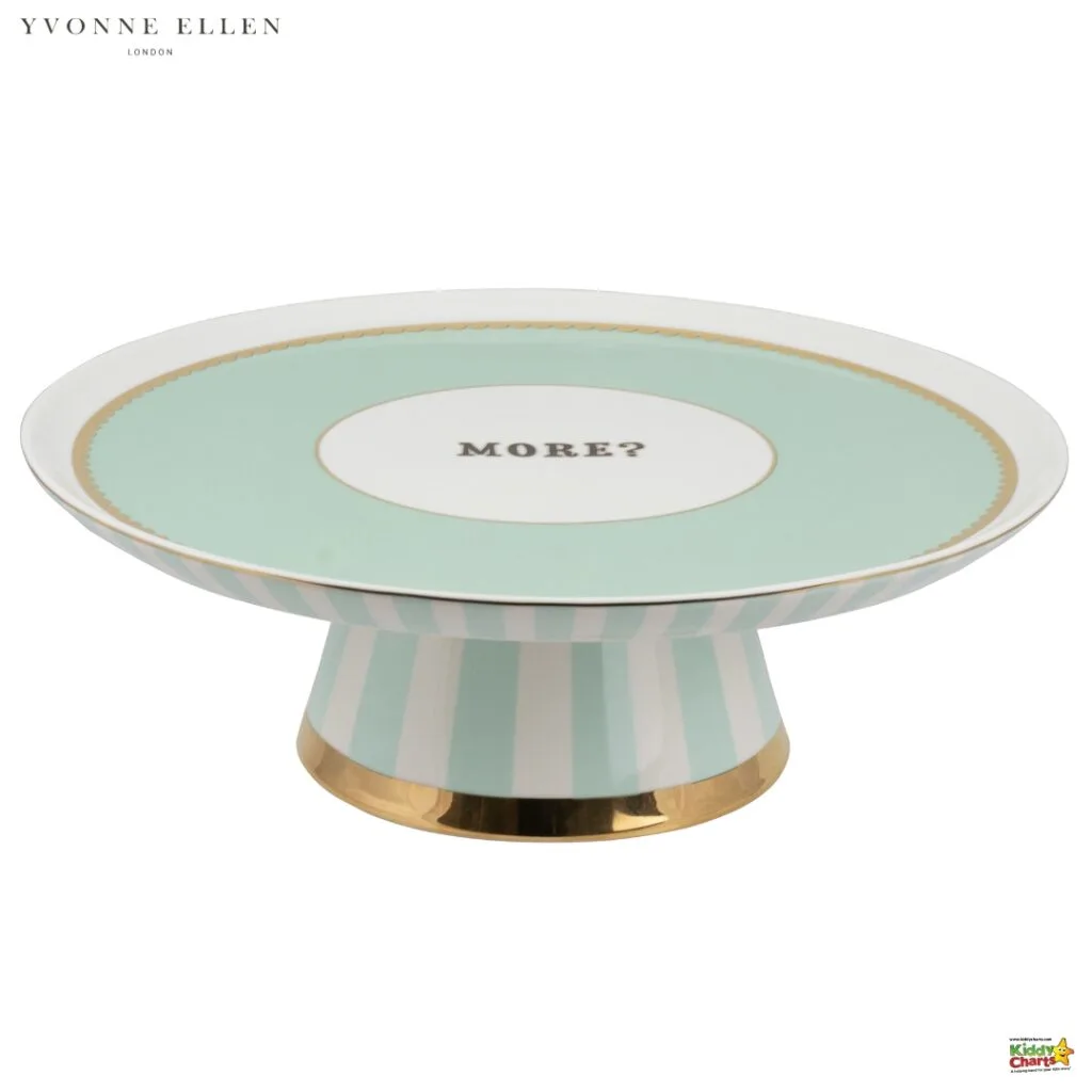 This image shows a pastel mint green and white striped cake stand with the word "MORE?" in the center, decorated with a gold rim and base.