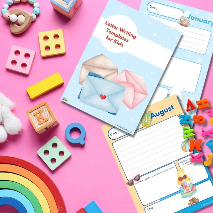 A colorful image with children's toys, wooden blocks, and printed letter writing templates for kids laid on a pink surface, promoting educational and playful activities.