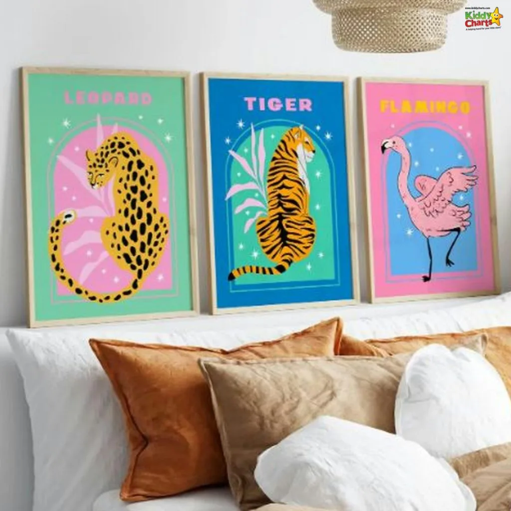 Three colorful animal posters—leopard, tiger, flamingo—adorn a bright, stylish room with cozy pillows on a bed.