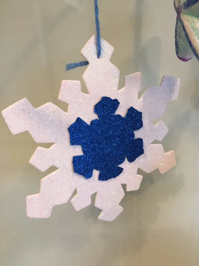 This is our snowflake for our snow mobile craft - one smaller over the top of the bigger one!