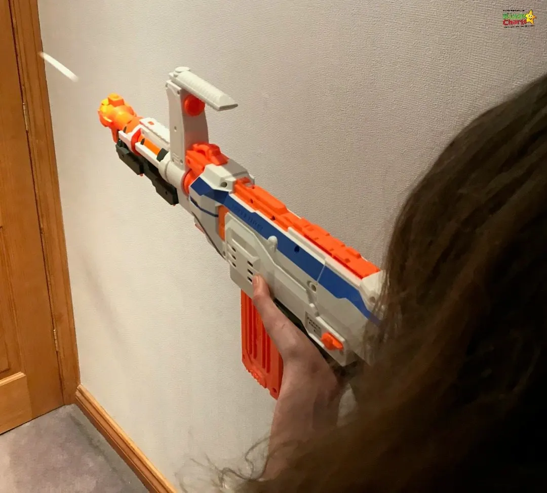 The obligatory action shot with the Nerf Gun - daughter getting stuck into the door!