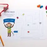 In this image, Sports McGee (the Athletic Monkey) is navigating a maze to reach the finish line while avoiding other sports trying to stop him.