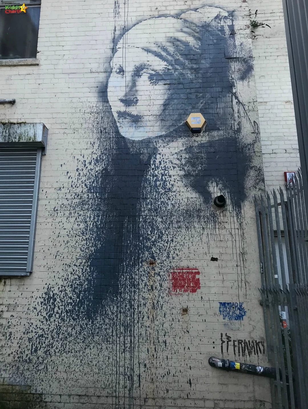 Banksy girl with a pierced ear drum Bristol