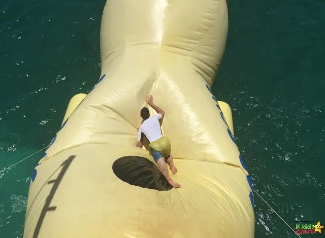 The Blob is a fun activity for older kids and adults on D Boat in Antigua - but it isn't easy to climb at all!