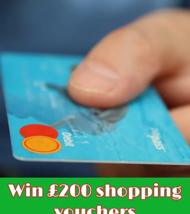 A person is entering a competition on the website Kiddy Charts to win £200 shopping vouchers with their Debit 11 pass.