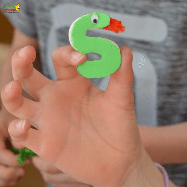 Here is the S in mid make in our easy cat craft for kids - just got to add the buttons now!