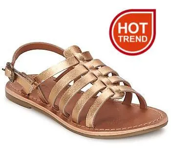 A beige and tan sandal shoe is trending hot this season.