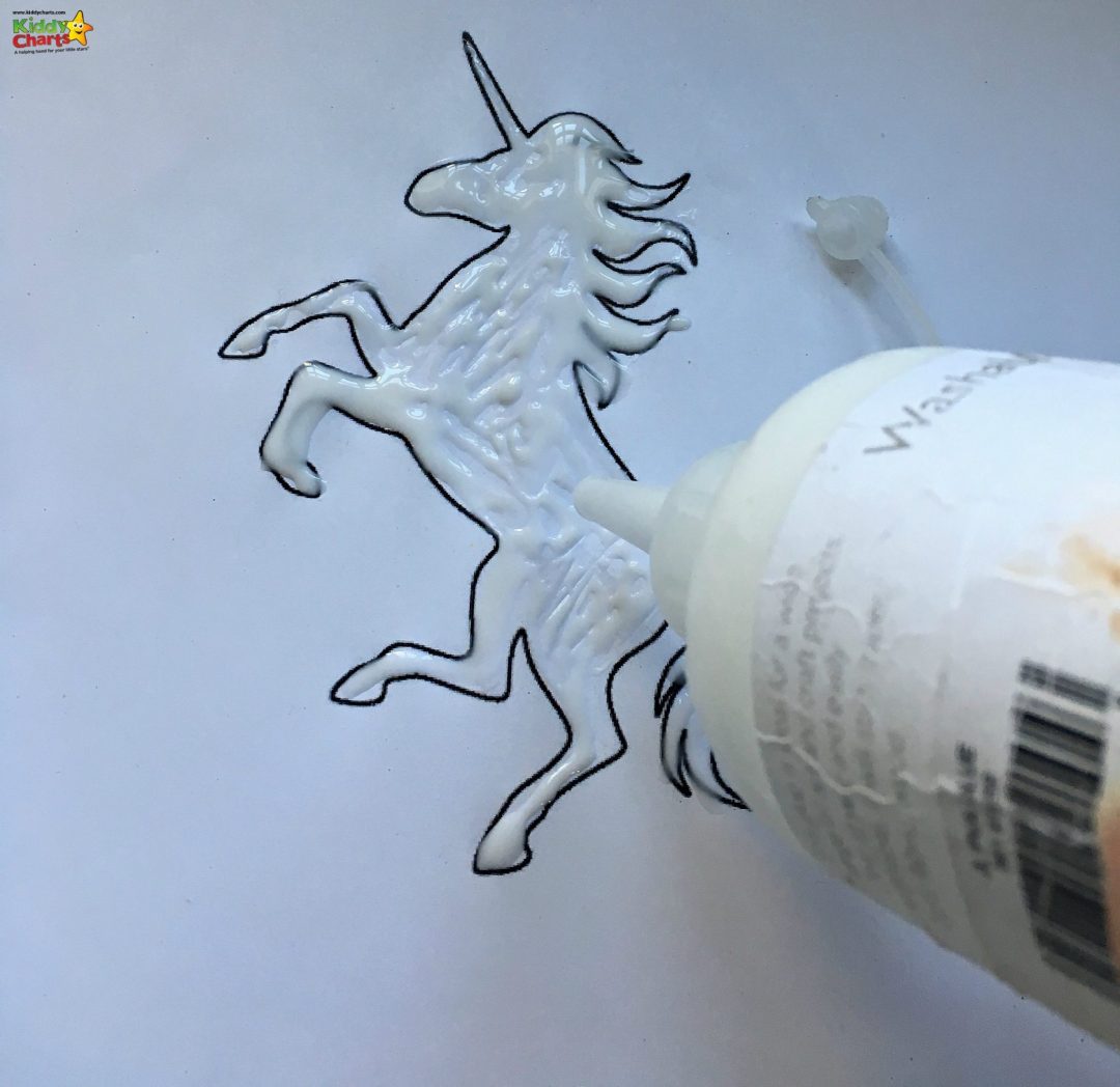 Add the glue to your unicorn to help make it perfect to get your glitter!