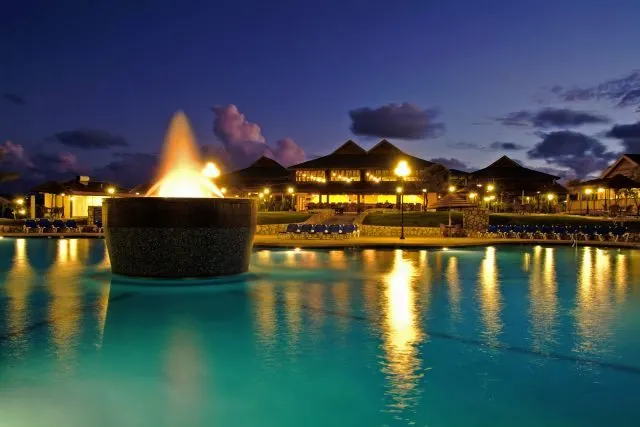 Verandah resport and spa pool at night here in Antigua